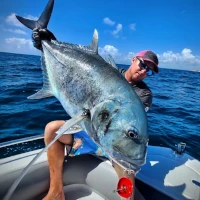 Angler holding a large fish